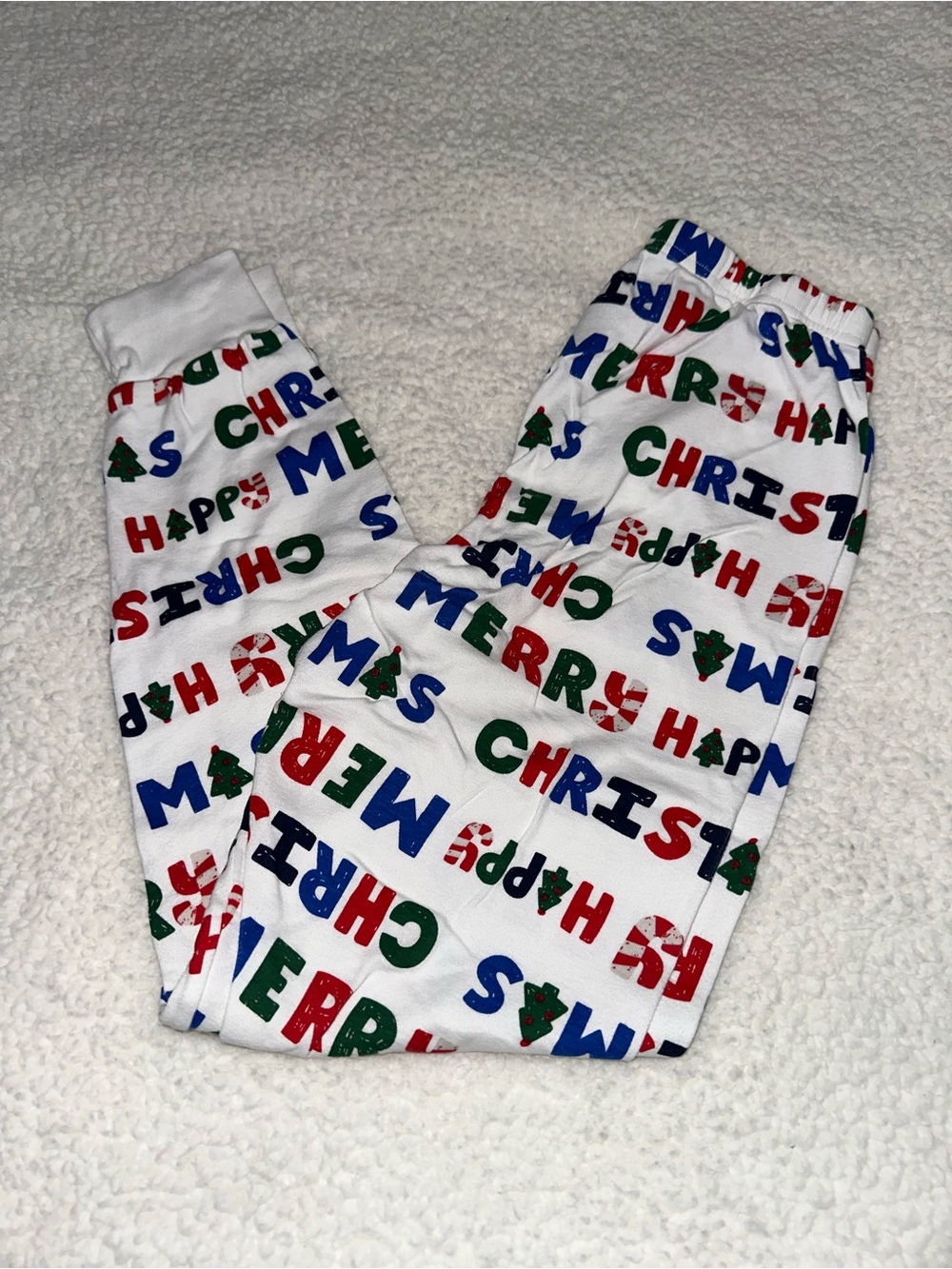 Carter's White Pajama Pants with Red, Blue and Green Holiday Motifs